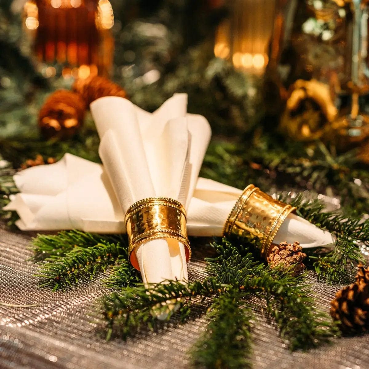 Set of 4 napkin rings - hammered metal color gold