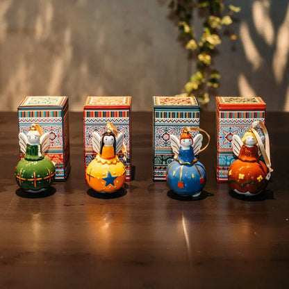 Designer ceramic balls 4 angels with bells as Christmas decoration